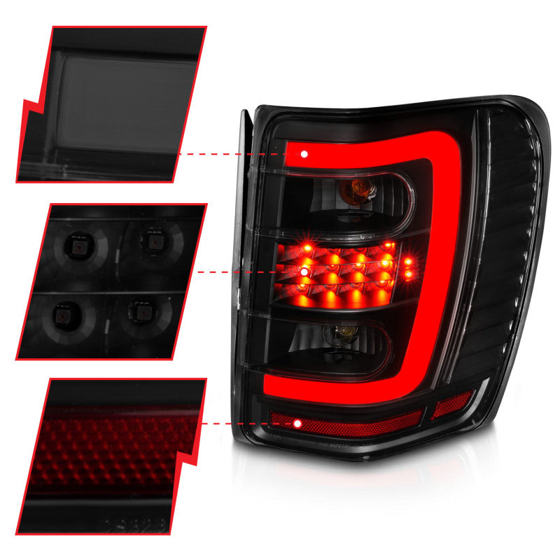 ANZO 1999-2004 Jeep Grand Cherokee LED Tail Lights w/ Light Bar Black Housing Smoke Lens