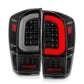 ANZO 16-21 Toyota Tacoma LED Tail Lights - w/ Light Bar Sequential Black Housing & Clear Lens